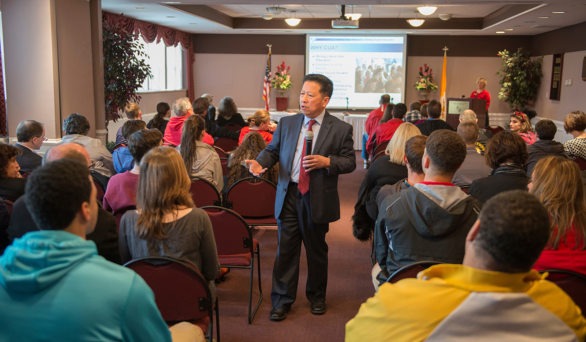 Dean Nguyen speaks to prospective students